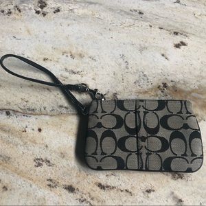 COACH wristlet. Black and Grey